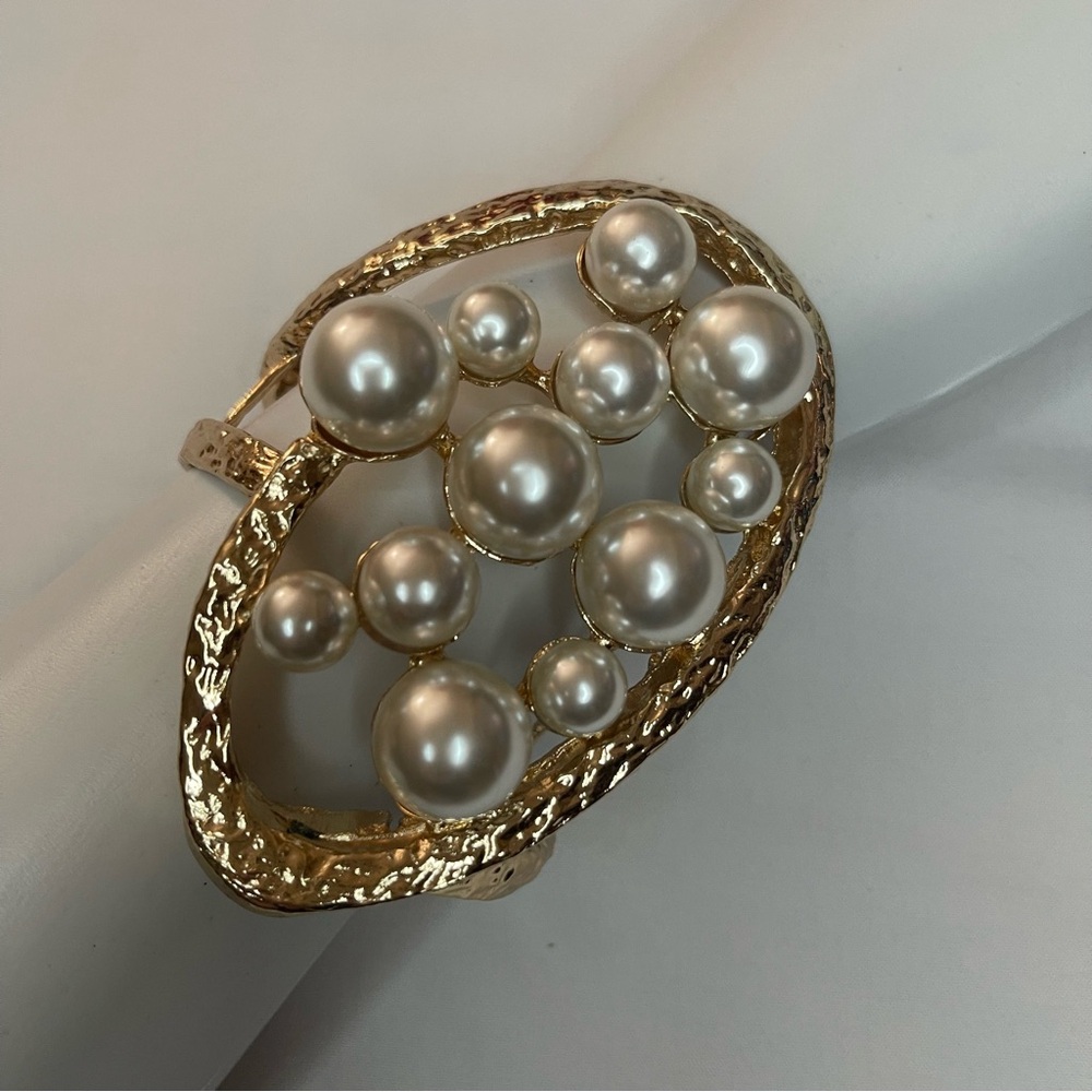 Gold tone statement oval shape faux pearls details  metallic cuff bracelet